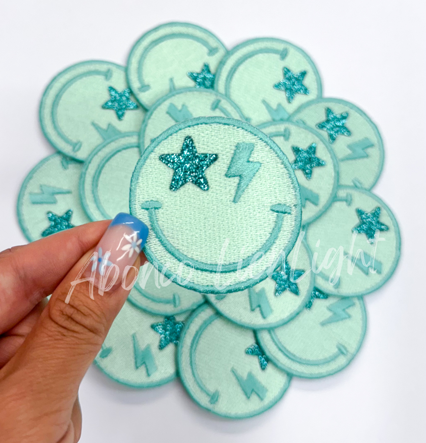 Turquoise glitter smiley face patch