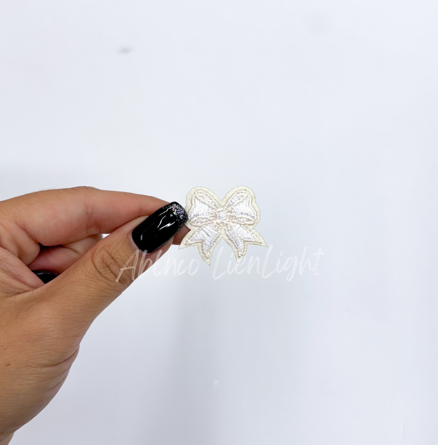 White dainty bow patch