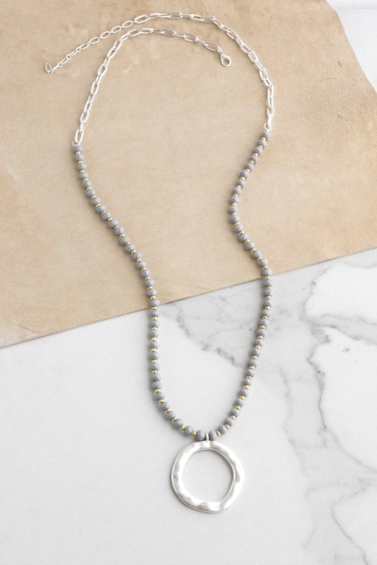 Beaded Necklace with Silver Tone Circle Pendant