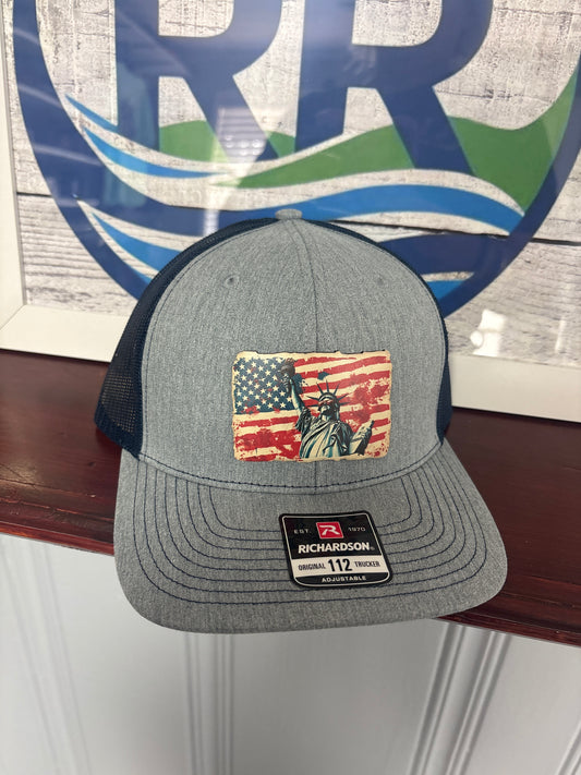 UV Patch Richardson 112 Trucker Cap: Distressed Flag Lady Liberty