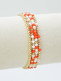 Set of 4 Orange and White Bead Stretch Bracelets
